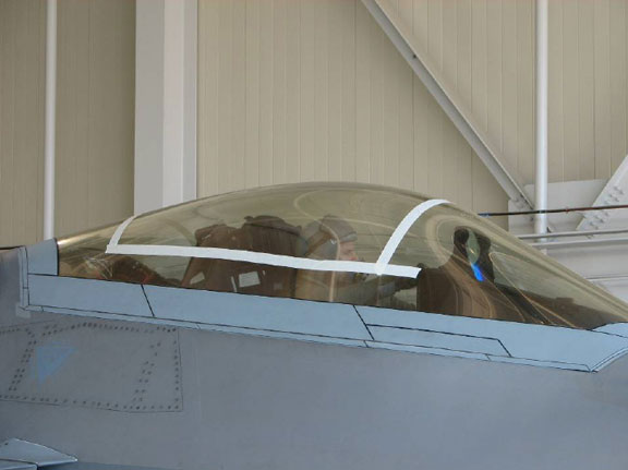 Tape lines have been added to the canopy of F-22 03-041 to guide rescuers in cutting the canopy to free the trapped pilot.